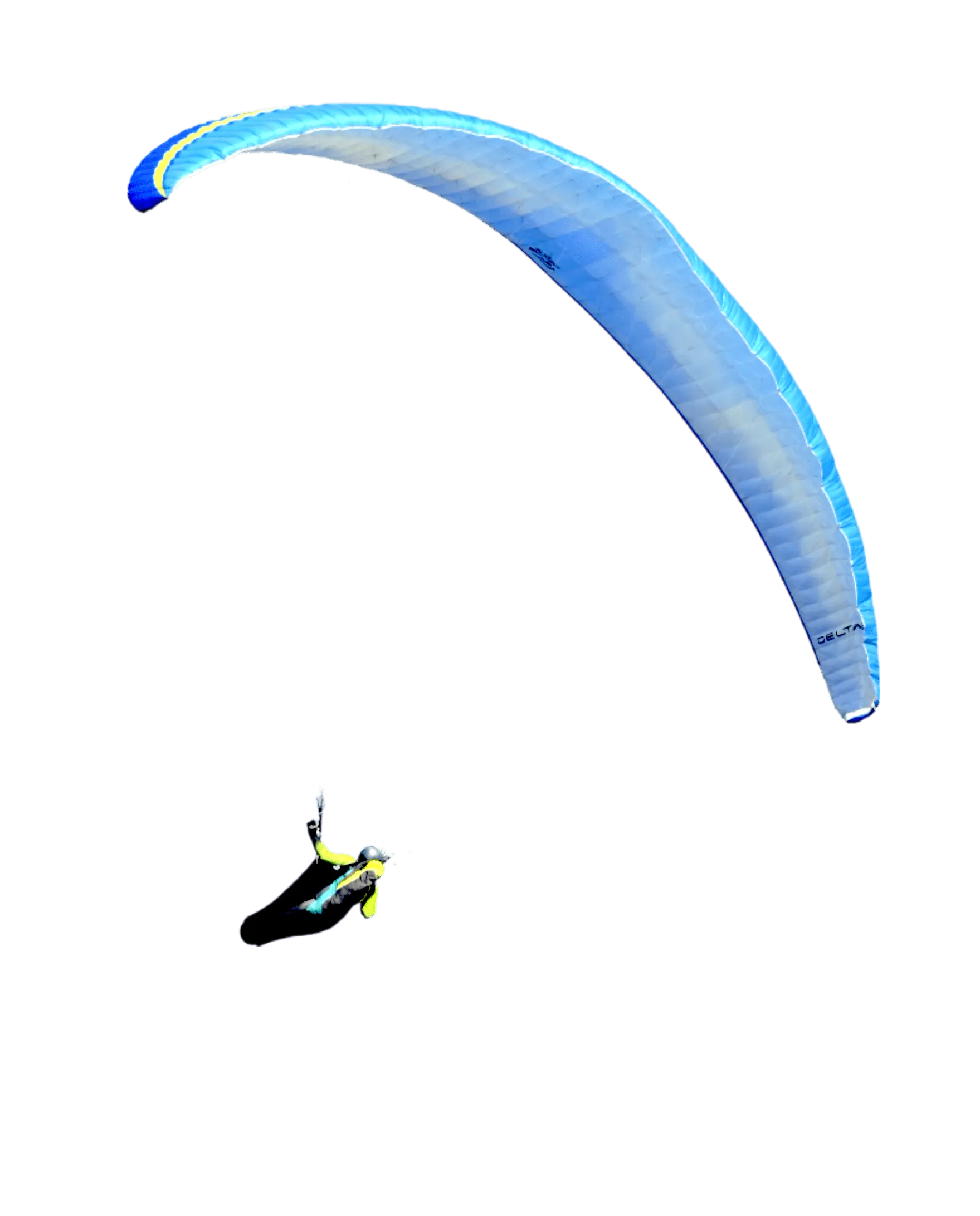 A floating paraglider between the mountains